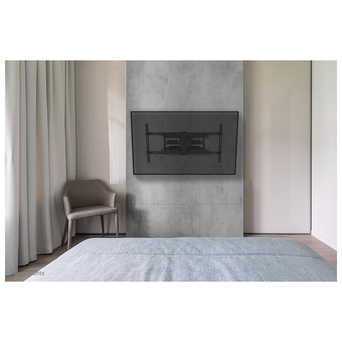 Neomounts WL40-550BL18 Supporto TV a parete Full Motion per schermi 43-75'' con regolazione inclinazione e rotazione fino a 54° e gestione cavi integrata colore Nero